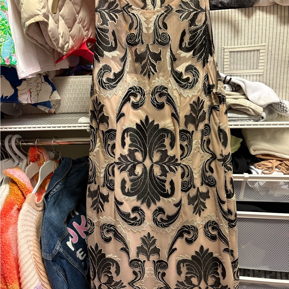 Elegant Black and Cream Patterned Dress
